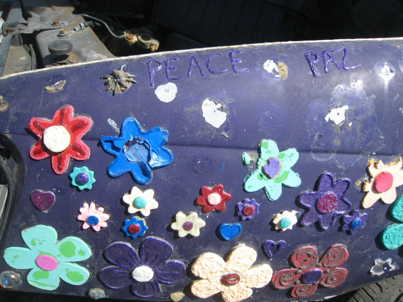 Illustration for article titled Groovalicious Purple Princess Of Peace Art Car Falls On Hard Times, Faces Crusher